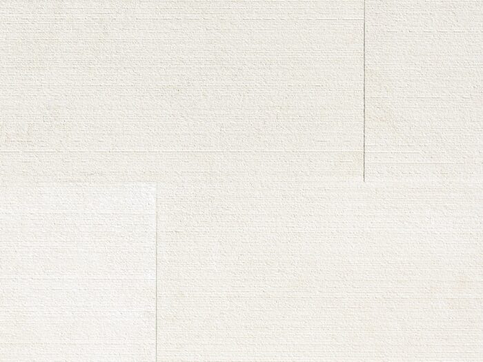 Closeup of AllClad Bordeaux Linear Raked natural stone tiles product