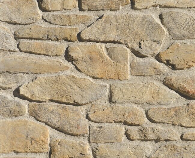 Closeup of Coyote Farmhouse Ledge manufactured stone veneer product