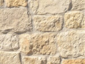 Closeup of Whitegold Orchard Limestone manufactured stone veneer product