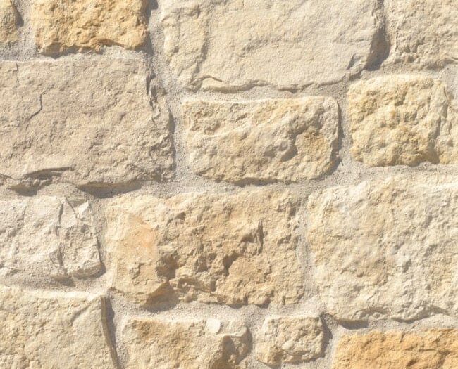 Closeup of Whitegold Orchard Limestone manufactured stone veneer product
