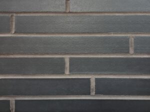 Manganese imperial brick product swatch with black mortar