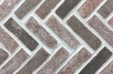 Noble Red Clay Thin Brick Herringbone on Mesh