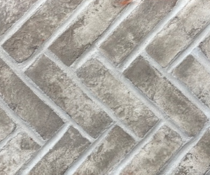 Doverton Gray Clay Brick on mesh shown with white mortar