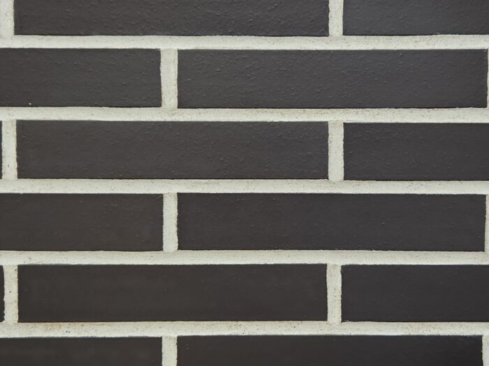 Volcanic Black norman brick product swatch with white mortar