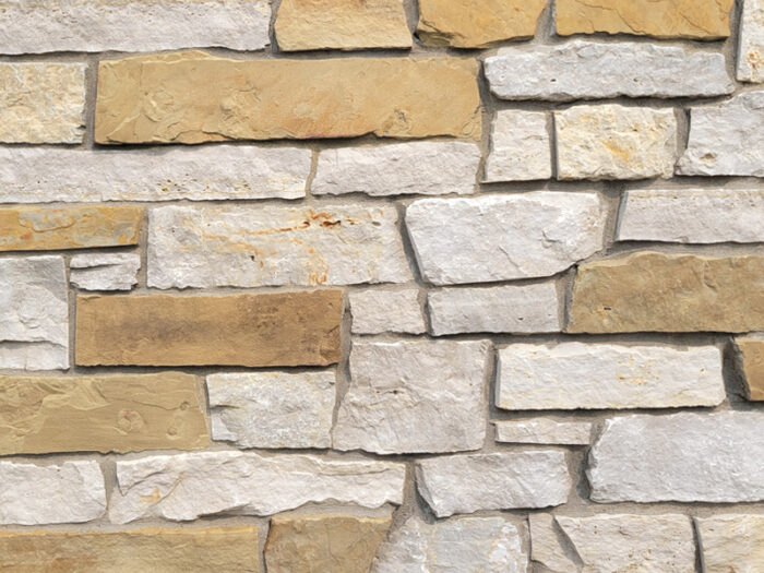 closeup of acorn bluff natural stone veneer display with standard grey mortar