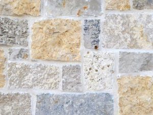 closeup of alpine trail natural stone veneer display with white mortar