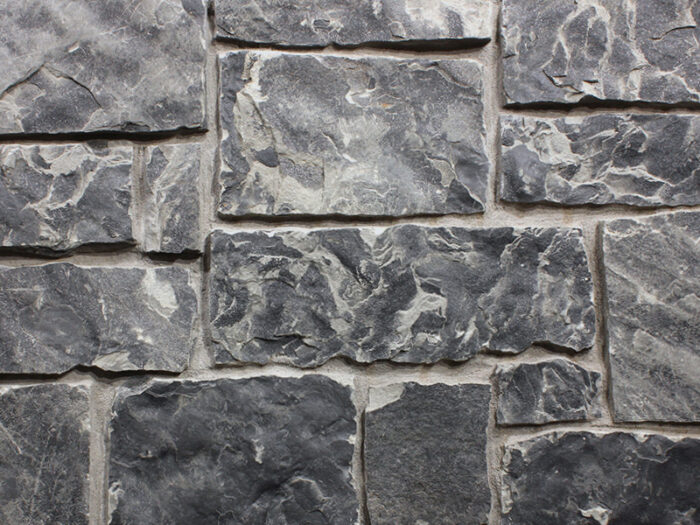 Closeup of blacksmith forge natural stone veneer product