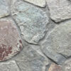 closeup of chilton web wall natural stone veneer display with standard grey mortar