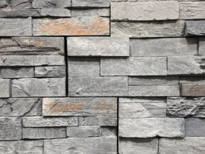closeup of dotsero urban ledge manufactured stone veneer panel display drystacked without mortar