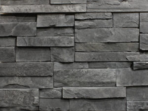 closeup of ebony urban ledge manufactured stone veneer display drystacked without mortar