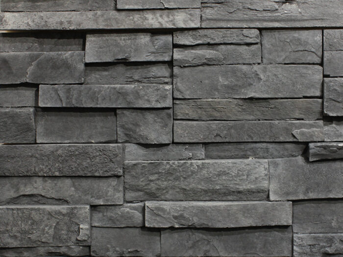 closeup of ebony urban ledge manufactured stone veneer display drystacked without mortar