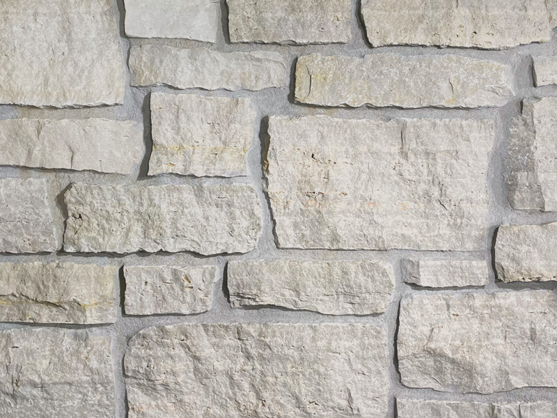 https://www.hedberghome.com/wp-content/uploads/fond-du-lac-country-squire-natural-stone-veneer-cream-tones-hedberg-home.jpg