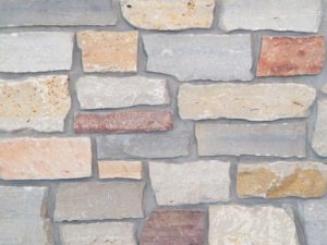 closeup of fountain hills natural stone veneer display with standard grey mortar