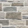 closeup of grey gull cottage natural stone veneer display with white mortar
