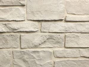 Harvest White Ridge manufactured stone veneer showroom display with white mortar