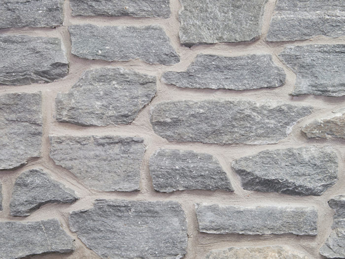closeup of barnwood blue seina natural stone veneer display with white mortar