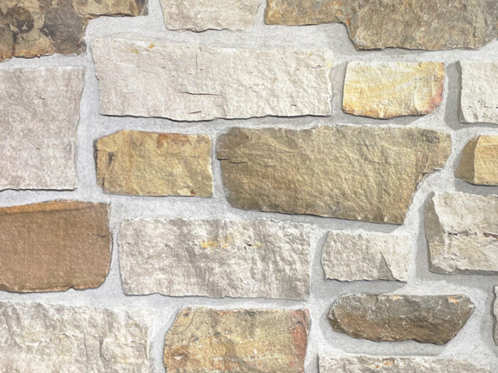 closeup of sugarland valley natural stone veneer display with standard restoration mortar