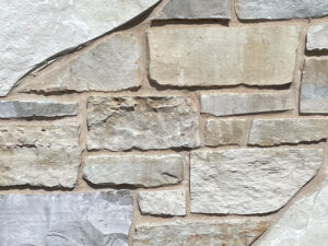 closeup of hobbs mill natural stone veneer display with standard gray mortar