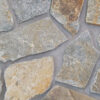 closeup of mcgregor lake cottage natural stone veneer display with standard grey mortar