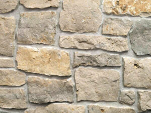 closeup of mill creek country squire natural stone veneer display with restoration mortar