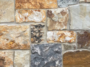 closeup of mission springs natural stone veneer display with standard grey mortar