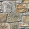closeup of mountain lodge natural stone veneer display with standard grey mortar