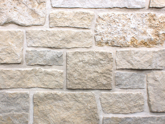 closeup of newport natural stone veneer display with standard grey mortar