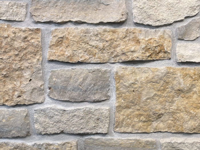closeup of provence natural stone veneer display with restoration mortar