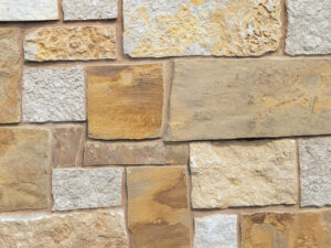 closeup of sandhill marsh natural stone veneer display with buff mortar