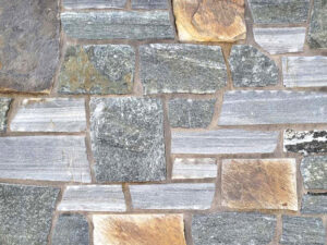 Silver Fox Forge natural stone veneer showroom display with standard grey mortar