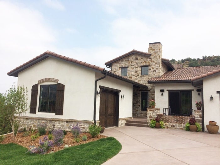 spanish mission home with alta smear natural stone exterior accent walls