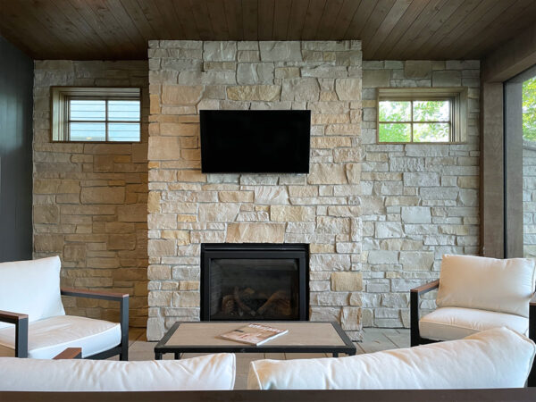 Kentucky run cream natural stone fireplace using the standard struck mortar technique