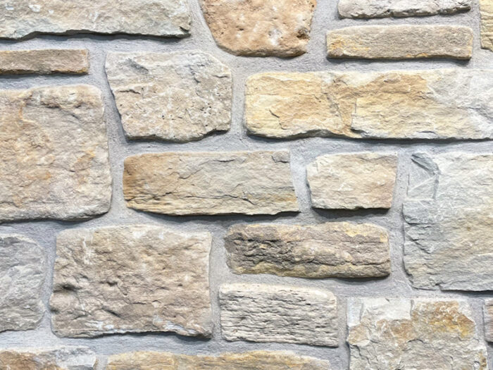 closeup of stone harbor weathered edge natural stone veneer display with restoration mortar