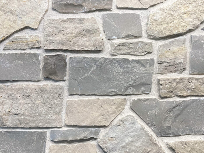 closeup of stony point lighthouse natural stone veneer display with white mortar