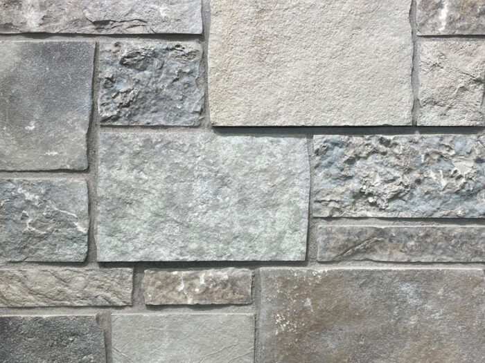 closeup of Vanderbilt Castle natural stone veneer display with standard grey mortar