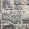 closeup of willowbrook blue castle rock natural stone veneer display with standard grey mortar